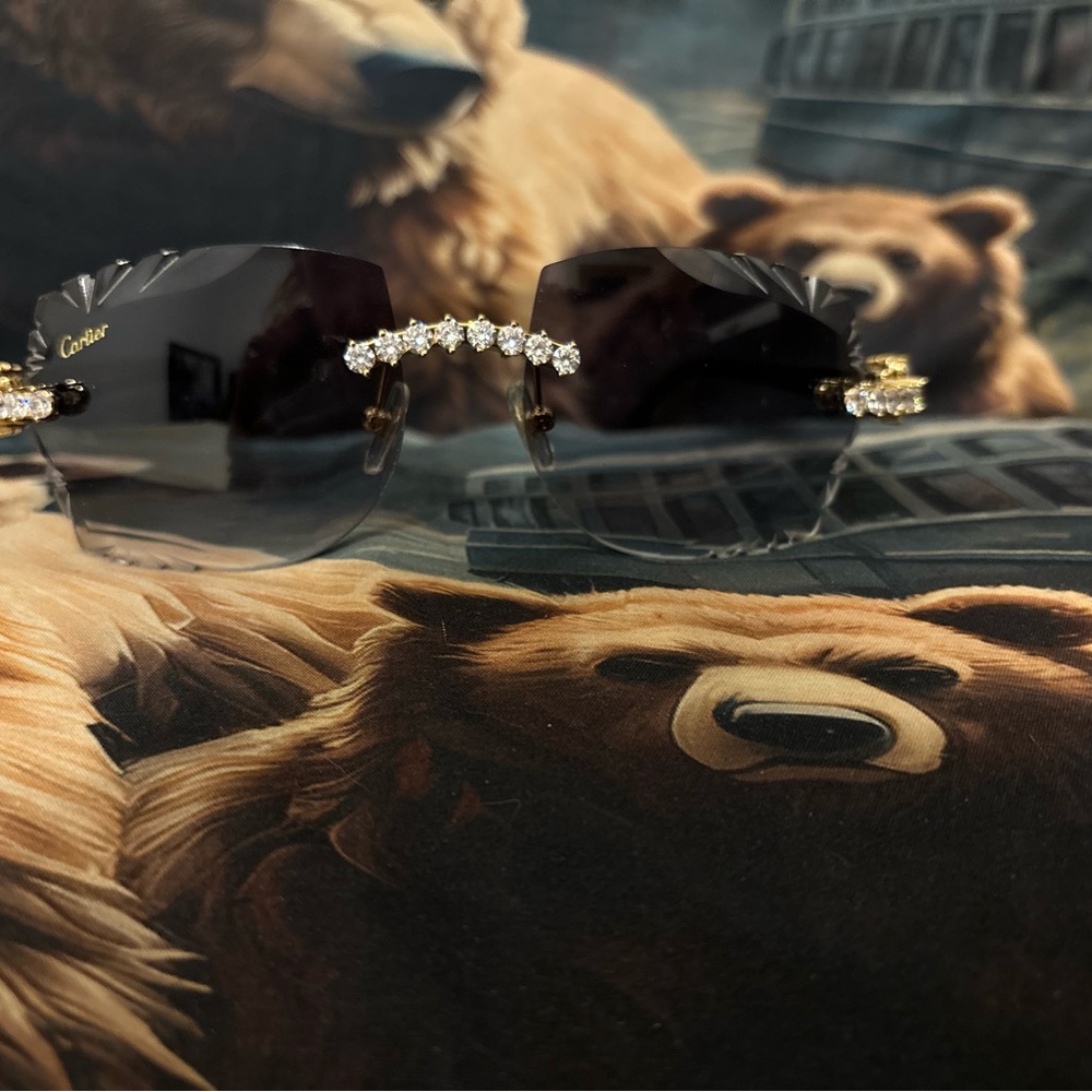 Cartier Women's Black Sunglasses with Gold and Silver Details